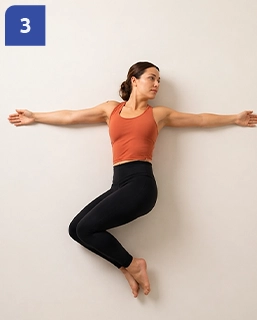 The same woman with her top arm reaching behind her, her chest turning open.
